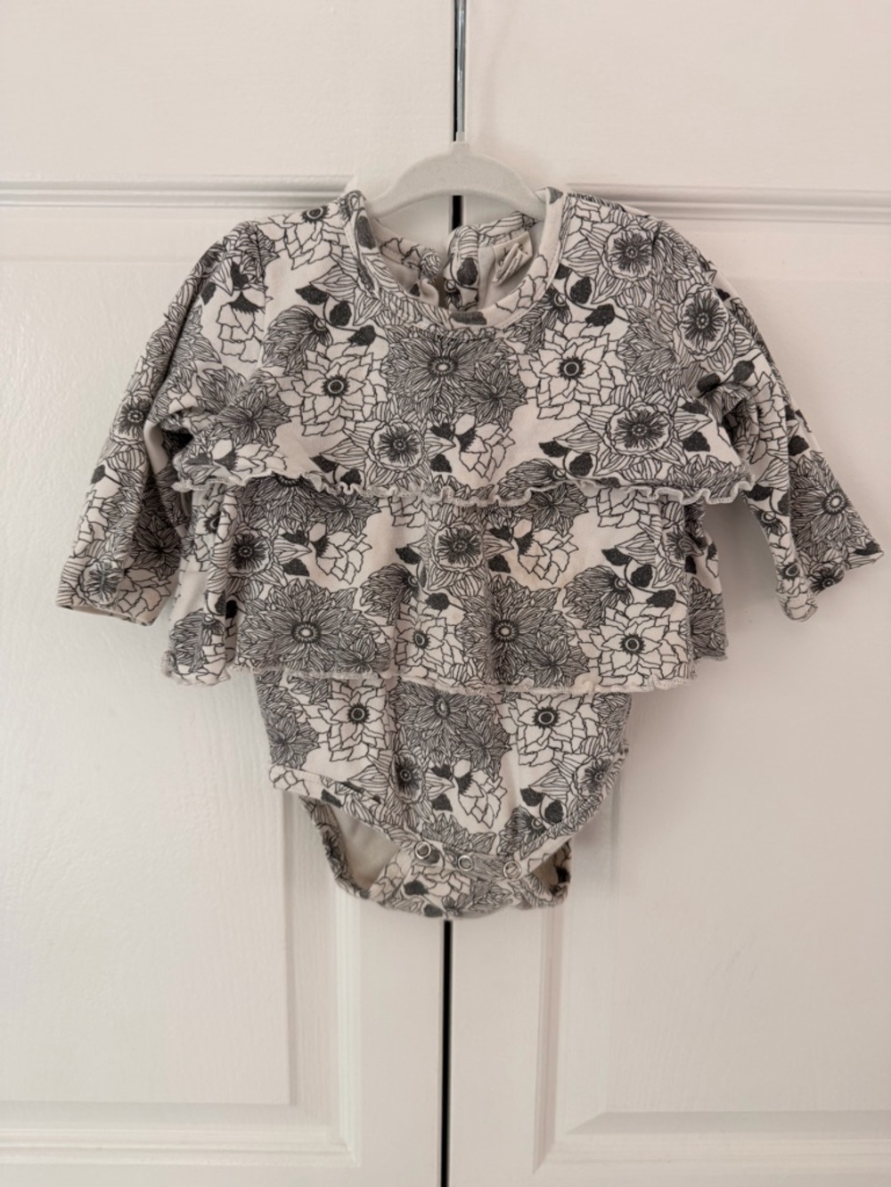 kate quinn Cream and Black Floral Ruffle One-Piece Bodysuit